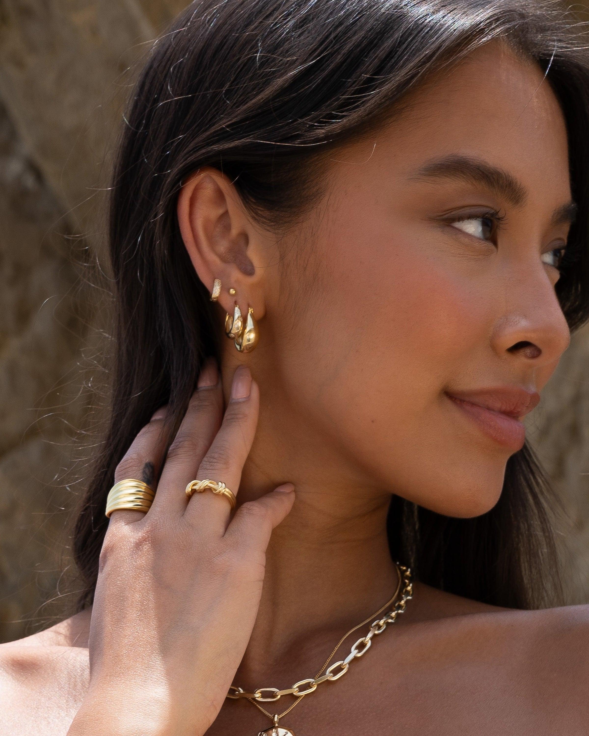 18K Gold Starburst Dome Huggie Earrings - Water Resistant & Hypoallergenic, Designed in LA.