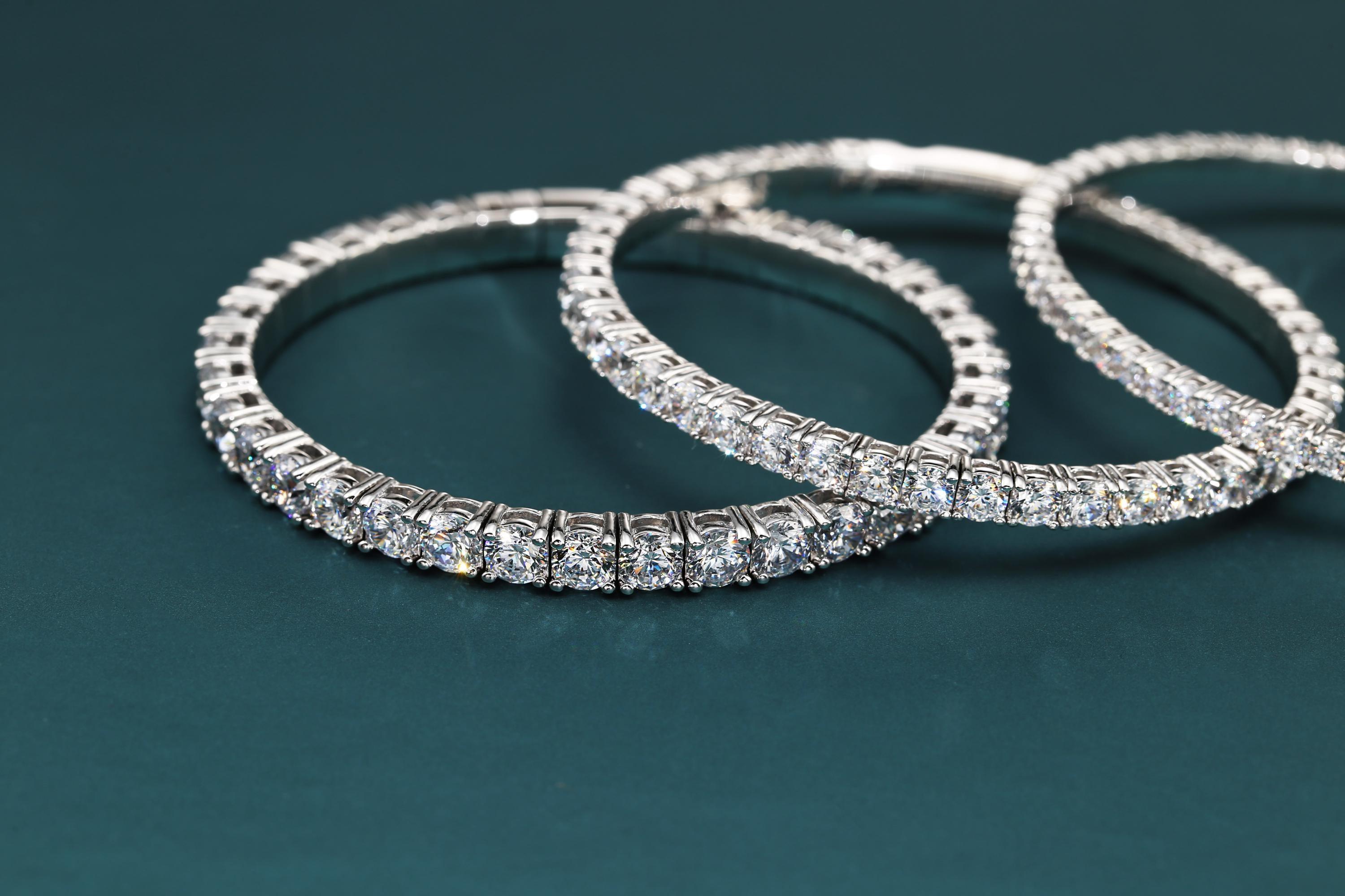 Elegant 14K Gold Sparkling Simulated Diamond Tennis Bracelet - Flexible Bangle Design.