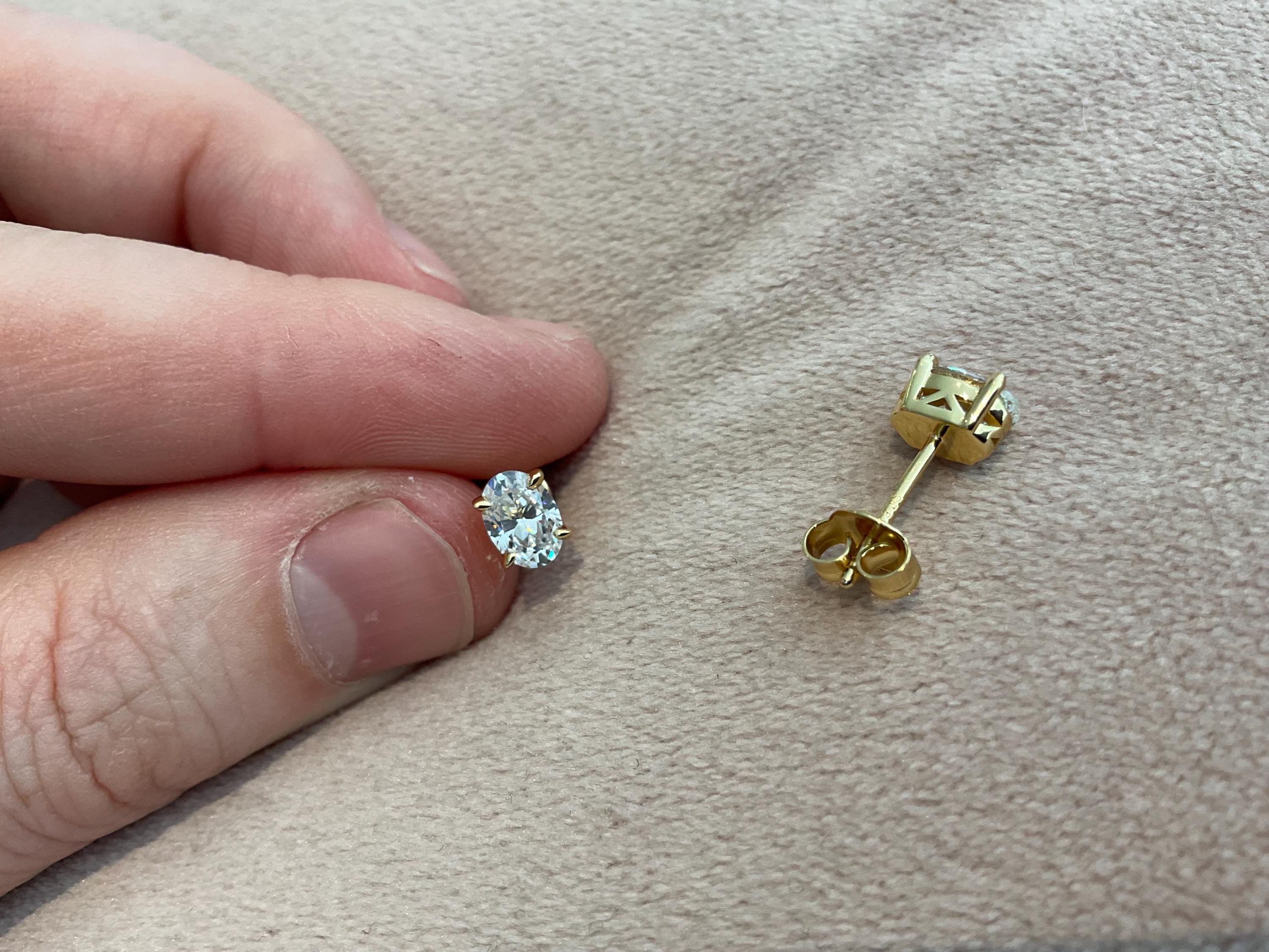 2.0 Carat Lab Created Diamond Oval Cut Set in 925 Sterling Silver and Gold Plated Overlay Hallmarked.