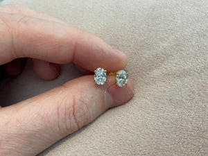 2.0 Carat Lab Created Diamond Oval Cut Set in 925 Sterling Silver and Gold Plated Overlay Hallmarked.