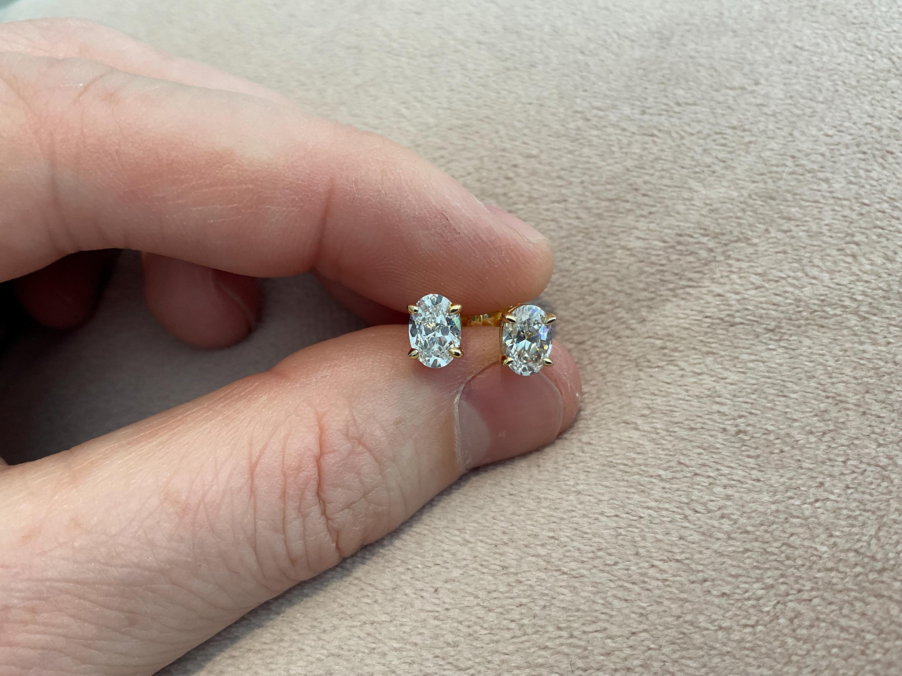 2.0 Carat Lab Created Diamond Oval Cut Set in 925 Sterling Silver and Gold Plated Overlay Hallmarked.