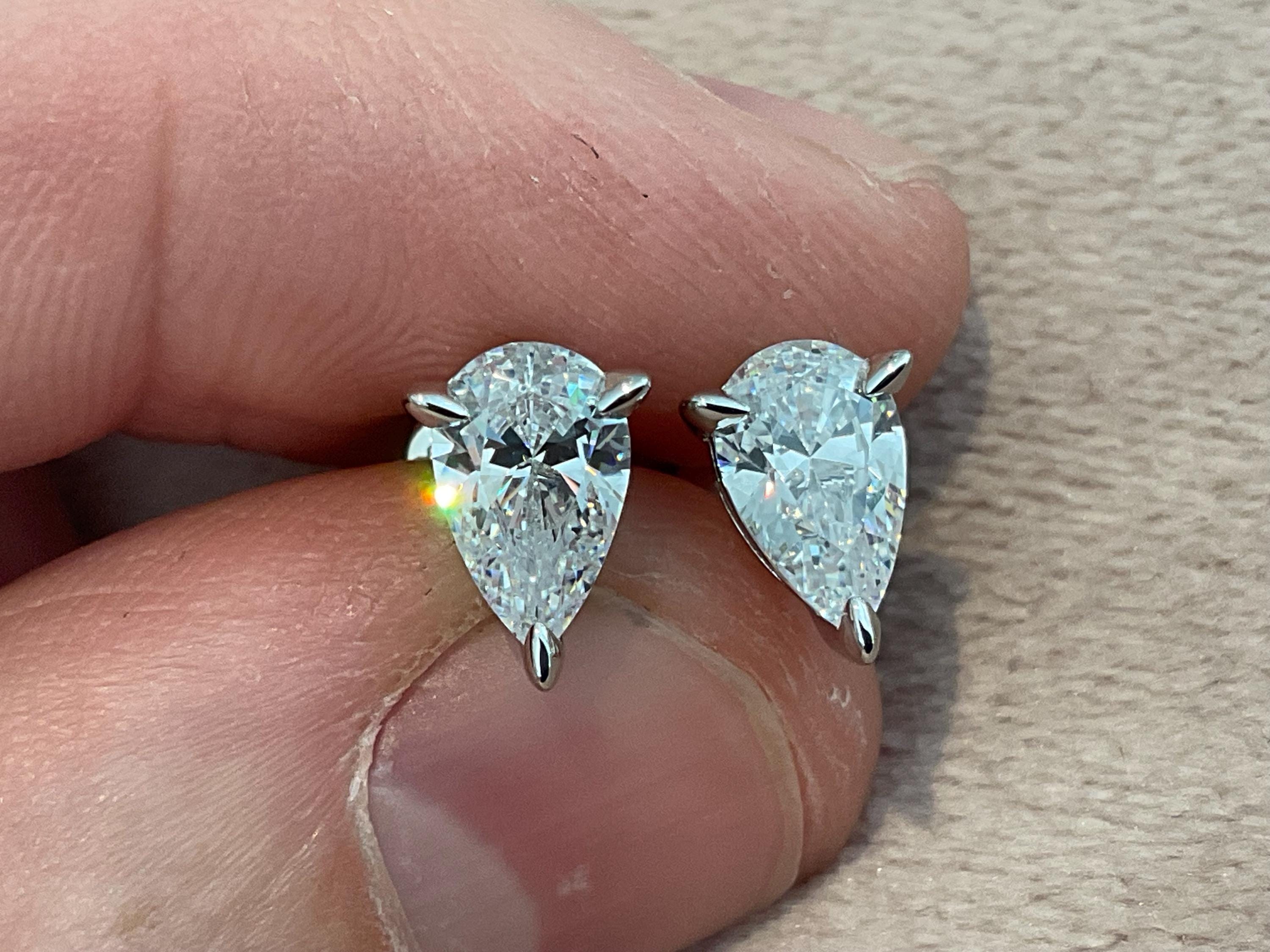 2.0 Carat Pear Cut Lab Created Diamond Earrings: Sterling Silver Platinum Overlay