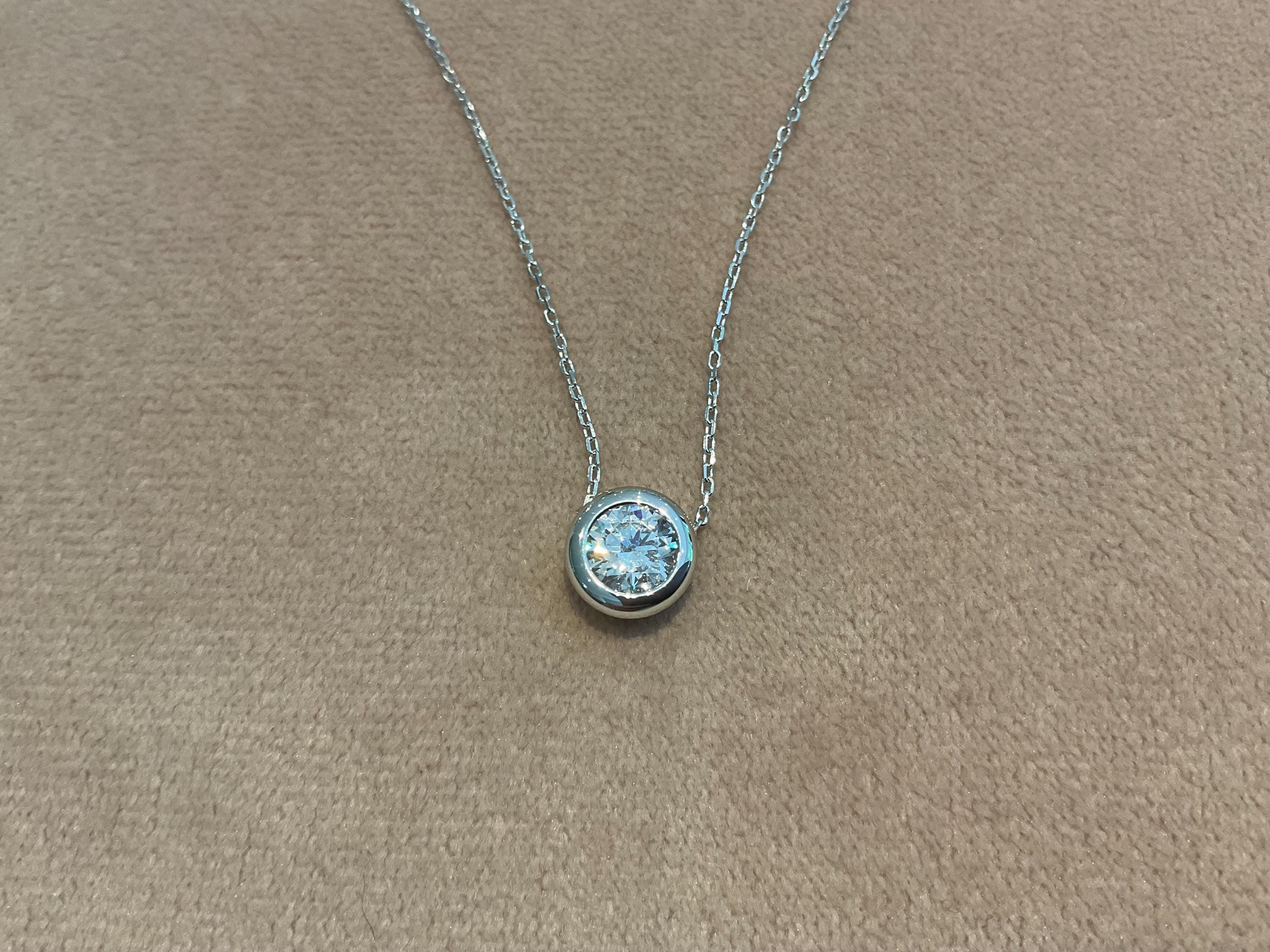 1.0 Carat Lab Diamond Necklace: Platinum Plated Silver Bezel Set