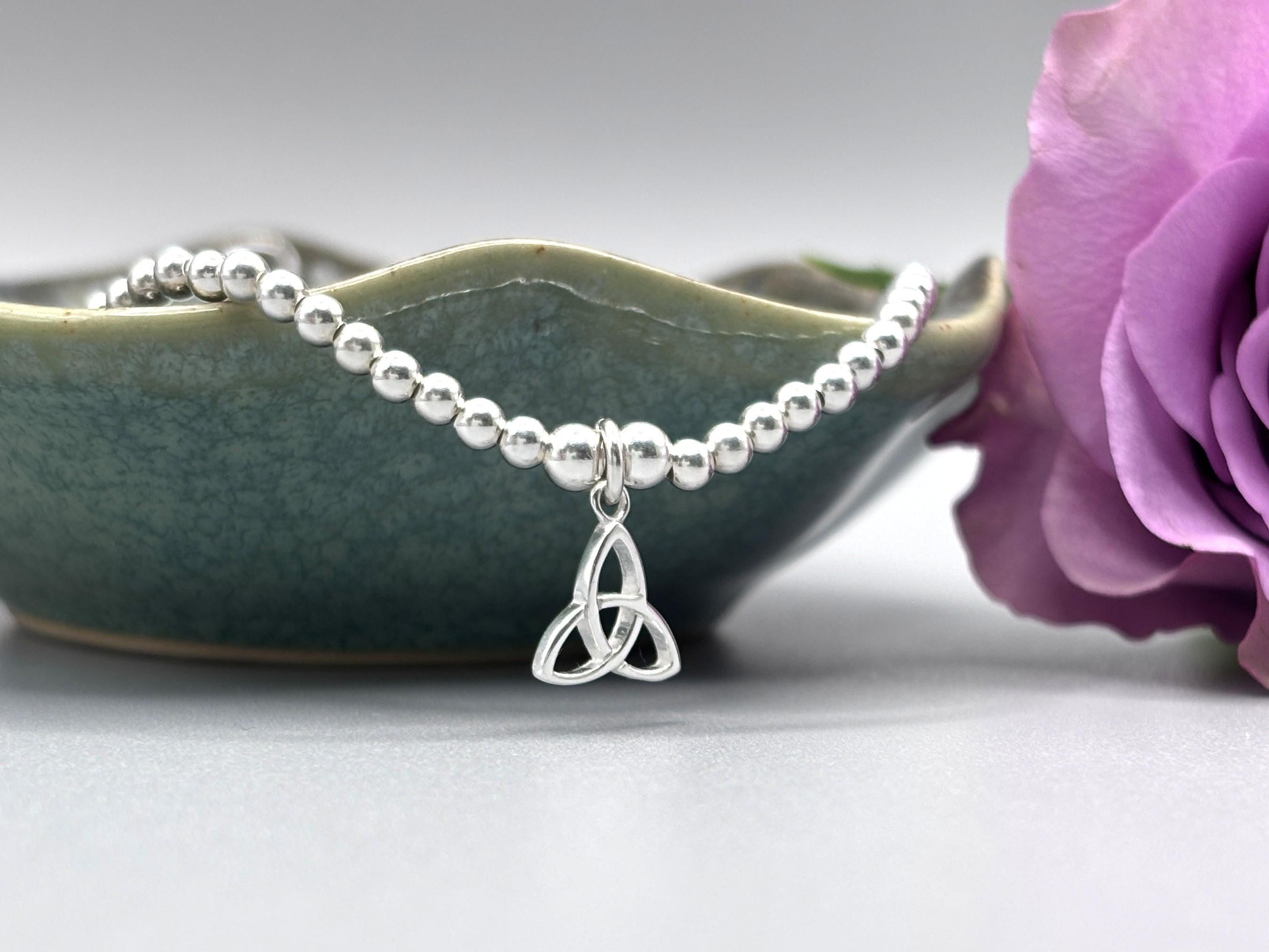 Elegant Sterling Silver Celtic Trinity Knot Bracelet with Trefoil Charm - Perfect Stacking Jewelry Gift.