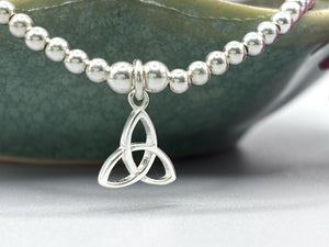 Elegant Sterling Silver Celtic Trinity Knot Bracelet with Trefoil Charm - Perfect Stacking Jewelry Gift.