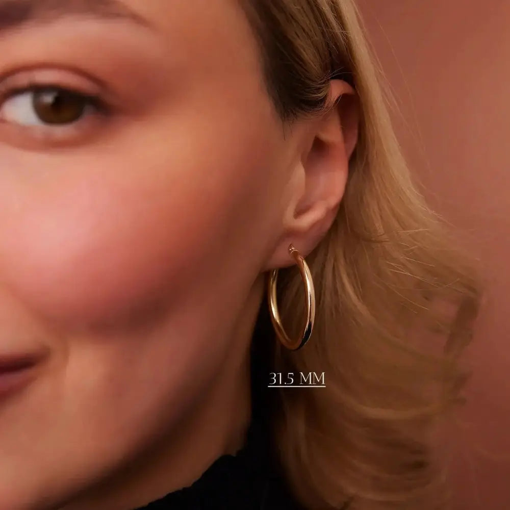 Luxurious 14K Gold Thick 3mm Waterproof Hoop Earrings for Everyday Elegance.