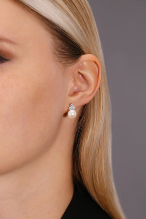 Elegant CZ Pearl Flower Stud Earrings in Sterling Silver.