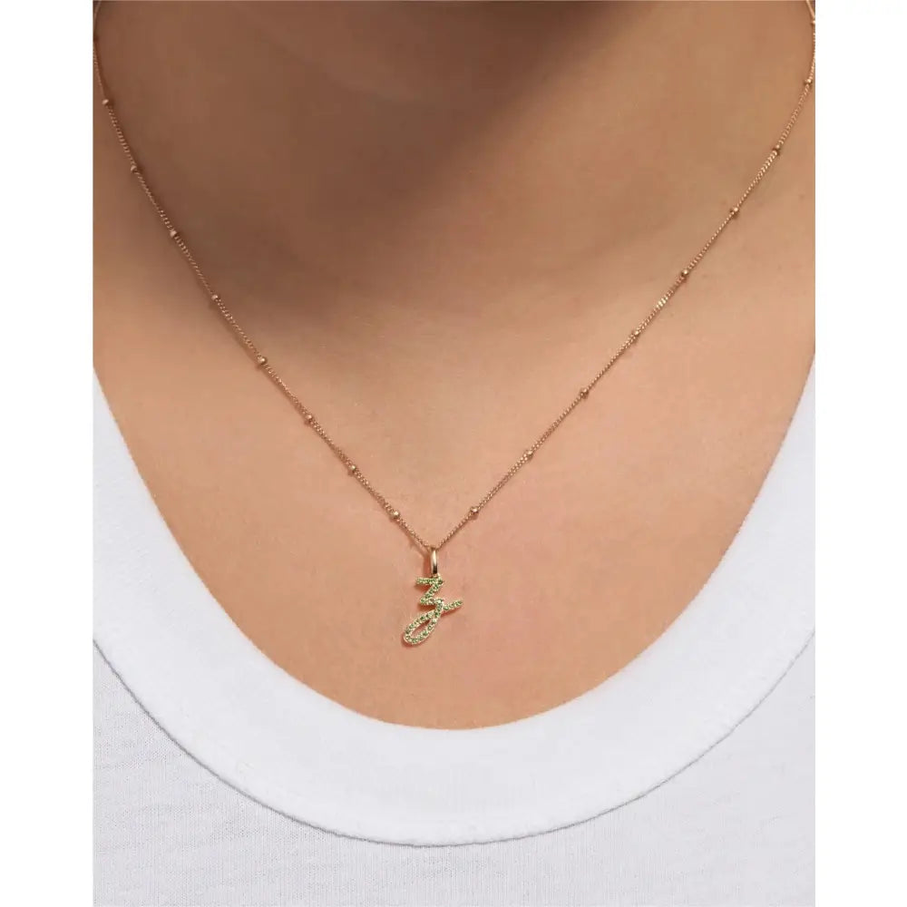 Personalized Gemstone Initial Pendant - Customizable Elegance.