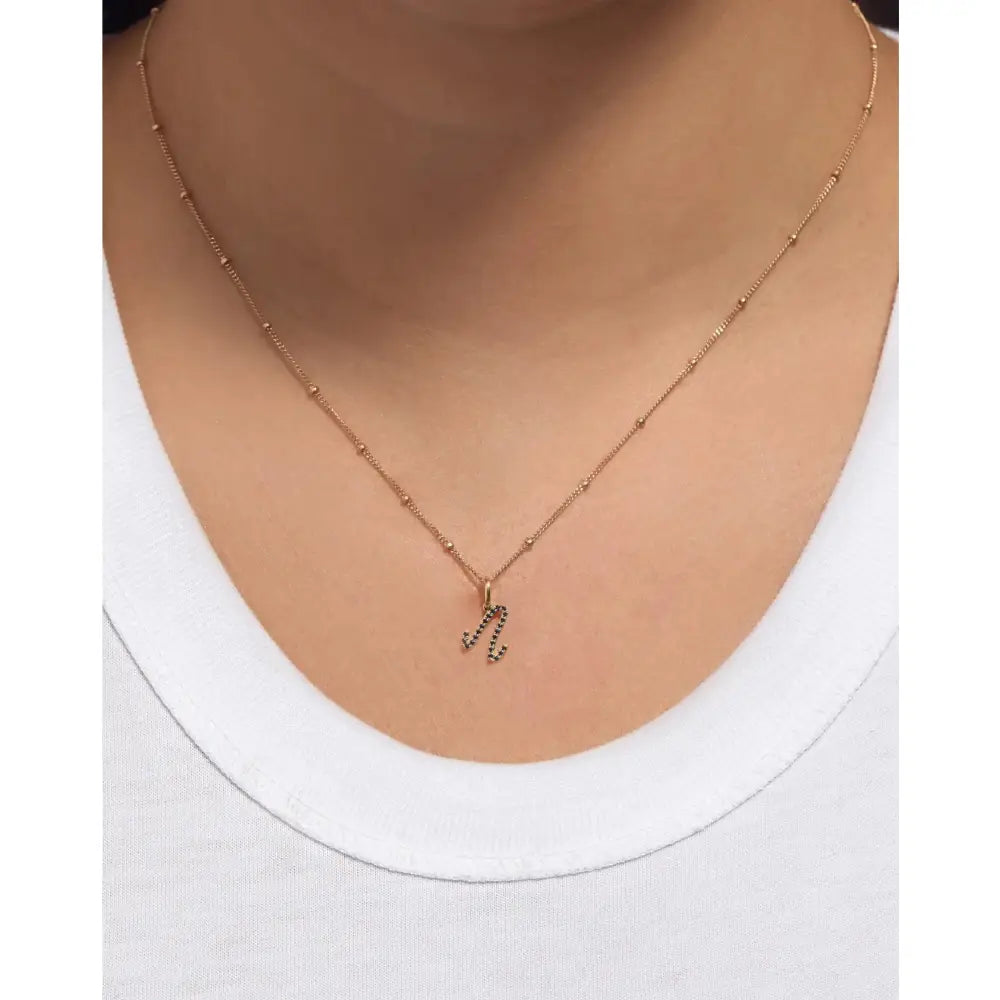Personalized Gemstone Initial Pendant - Customizable Elegance.