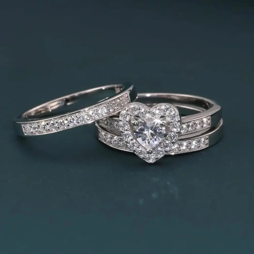 Radiant CZ Heart Three-Tier Engagement Ring Set in Sterling Silver - Perfect Bridal Ring Set for Proposals, Weddings, and Anniversaries.
