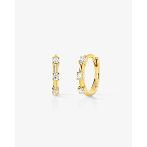 Sparkling Diamond Station Huggie Earrings - Elegant and Chic!.