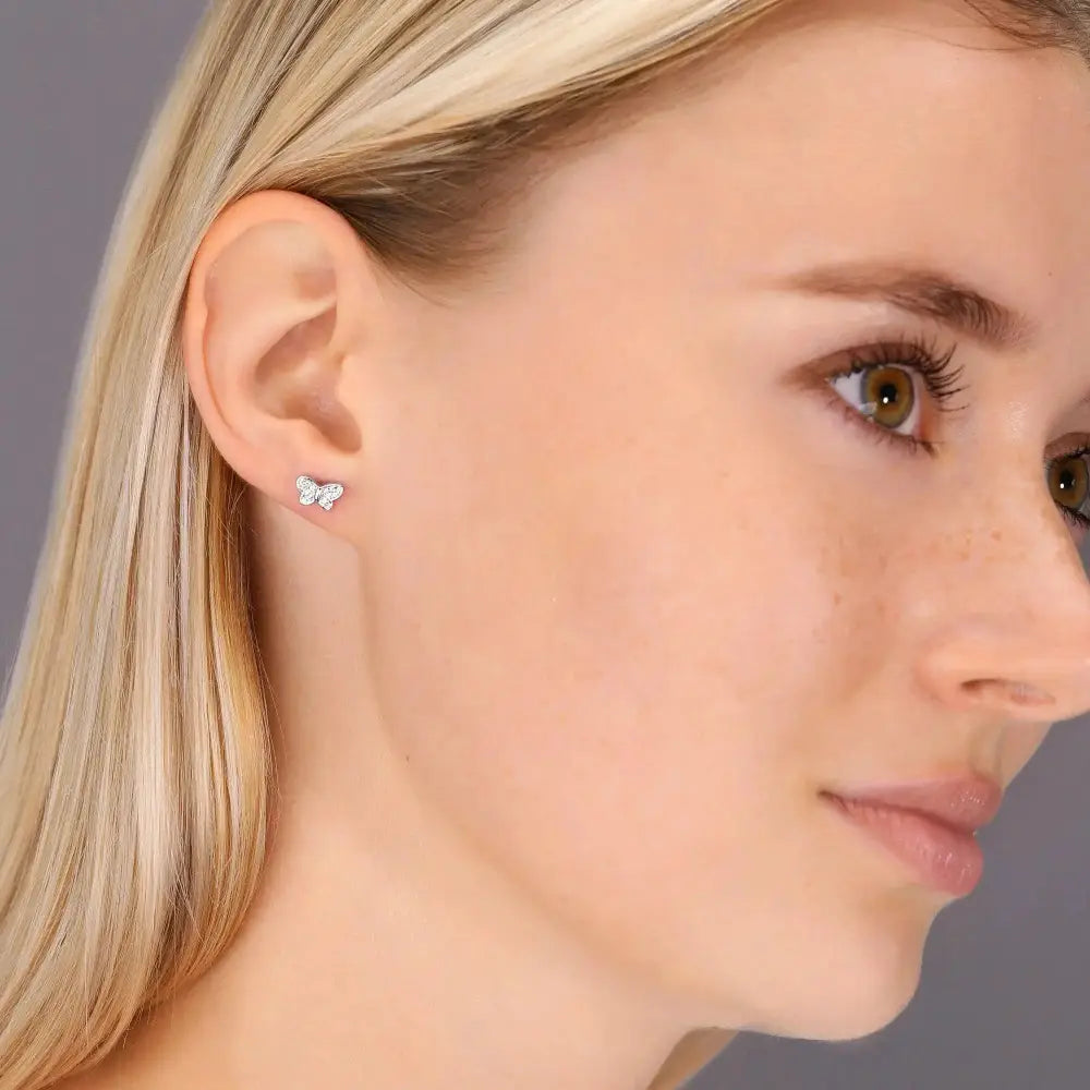 Sparkling Sterling Silver Butterfly Stud Earrings with CZ Accents.