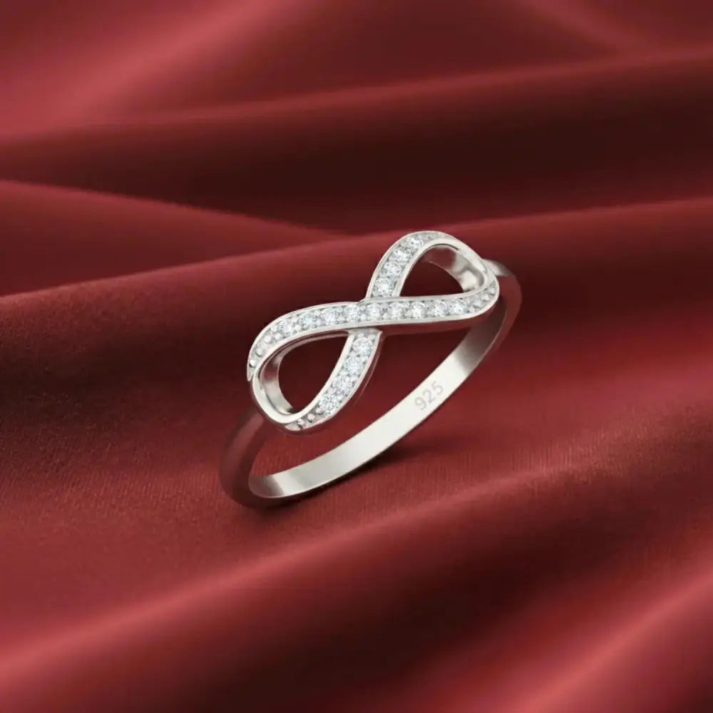 Sparkling Sterling Silver Infinity Ring with Simulated Diamonds – A Timeless Gift for Her on Any Occasion.