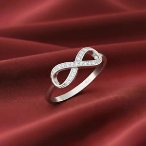 Sparkling Sterling Silver Infinity Ring with Simulated Diamonds – A Timeless Gift for Her on Any Occasion.