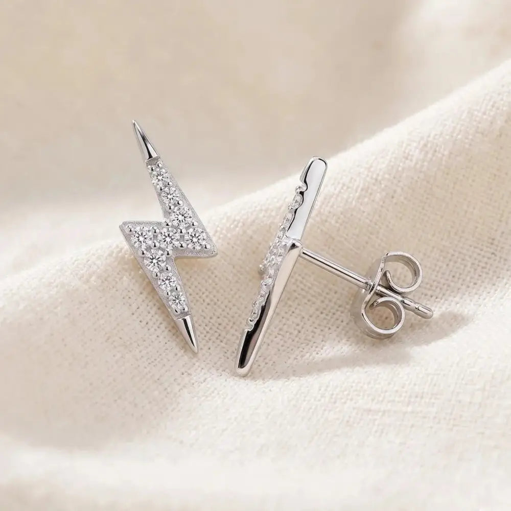 Sparkling Sterling Silver Lightning Bolt CZ Stud Earrings - Chic Pushback Design.