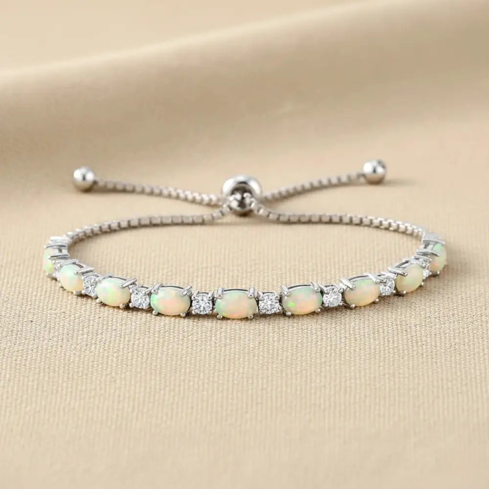 Sterling Silver Fire Opal Adjustable Bracelet with Cubic Zirconia Stones