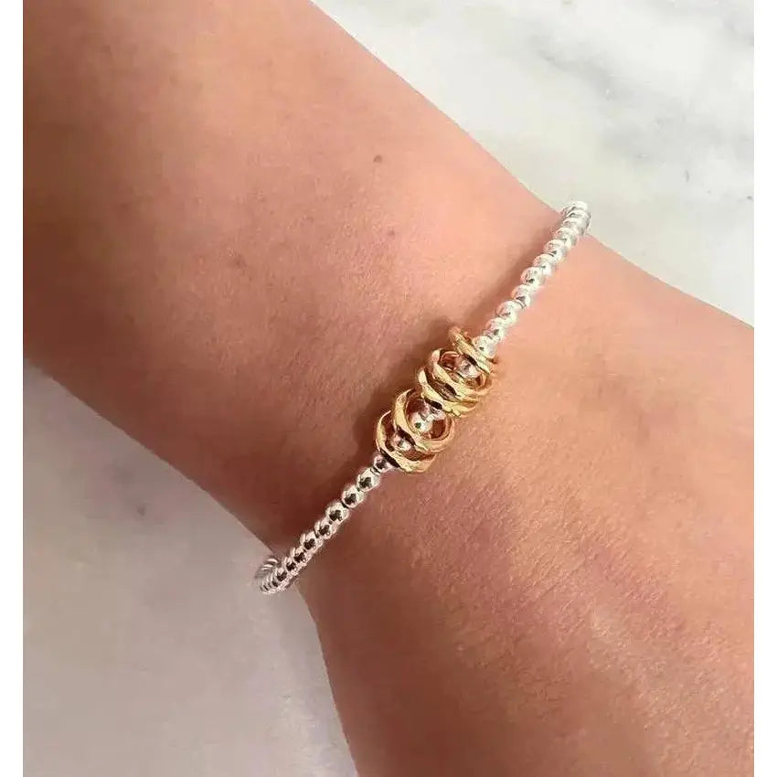 Sterling Silver Milestone Birthday Bracelet with Gold Decade Rings - A Custom Gift for Her.