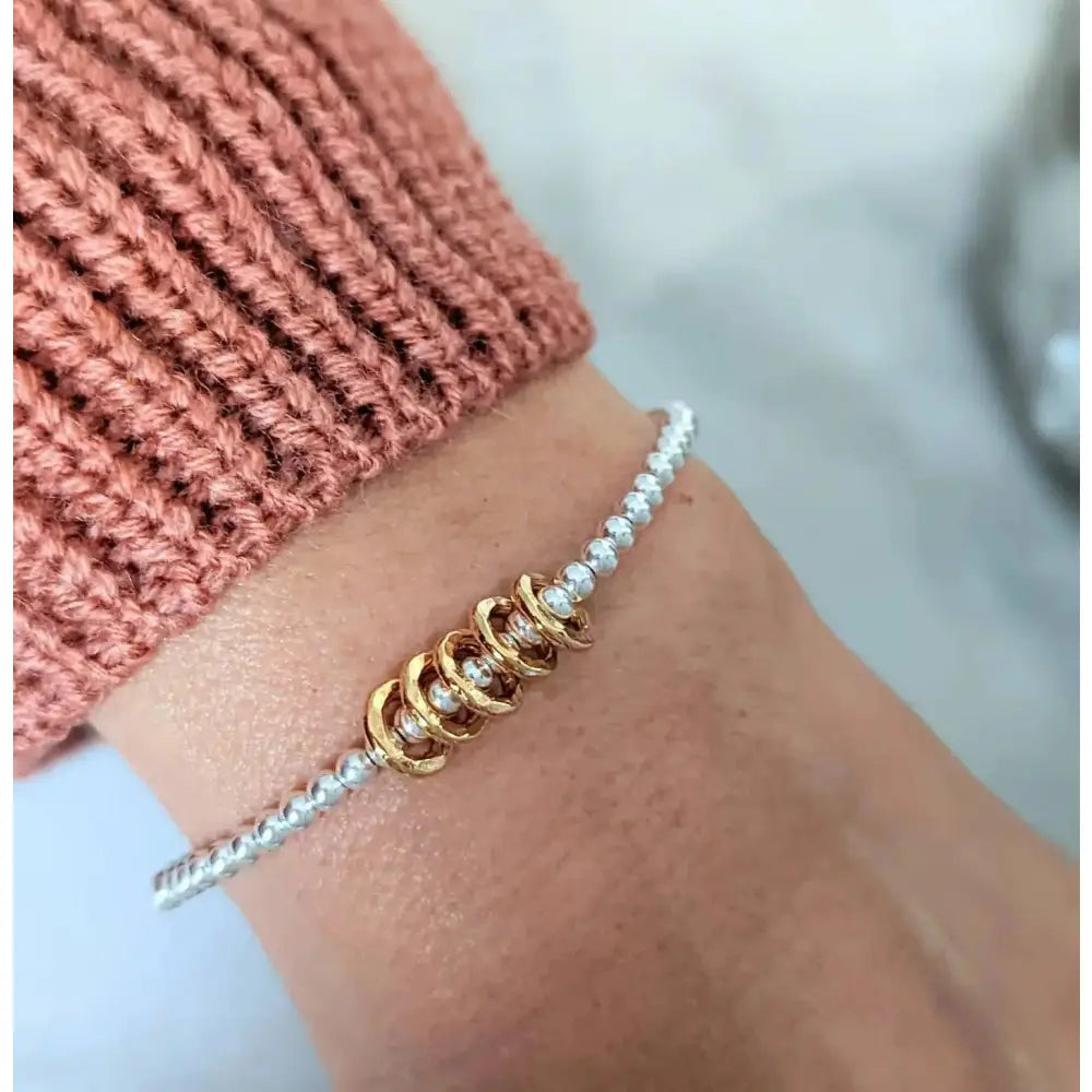 Sterling Silver Milestone Birthday Bracelet with Gold Decade Rings - A Custom Gift for Her.