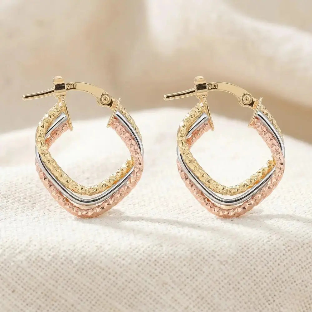 Stunning 10K Tri-Color Diamond-Cut Twist Italian Style Hoop Earrings.