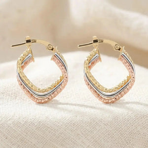 Stunning 10K Tri-Color Diamond-Cut Twist Italian Style Hoop Earrings.