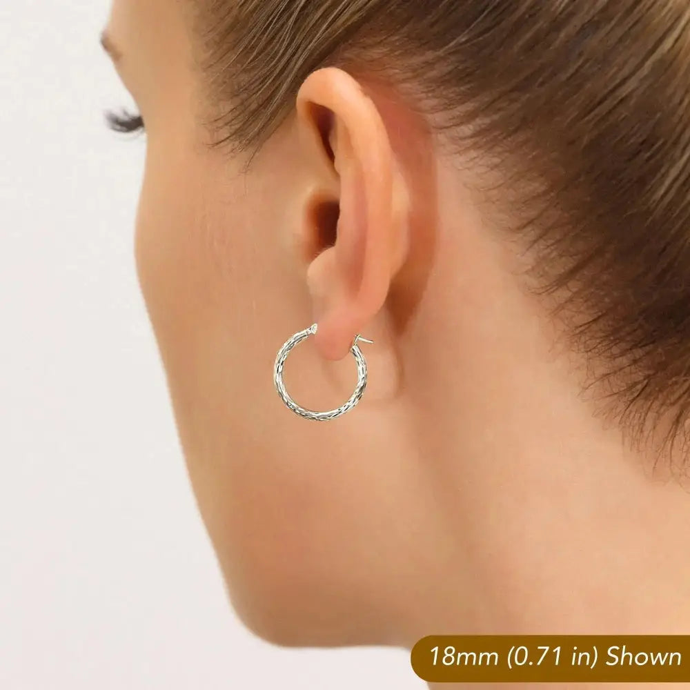 Stunning 10K White Gold Hand-Engraved Diamond-Cut Hoop Earrings - Crafted in the USA.