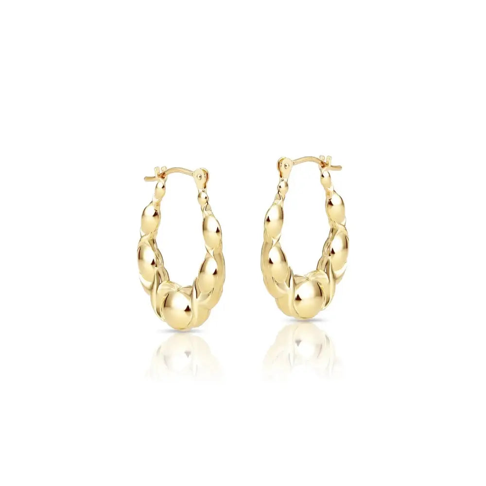 Stunning 10K Yellow Gold XO Polished Hoop Earrings - Chic NYC Design.