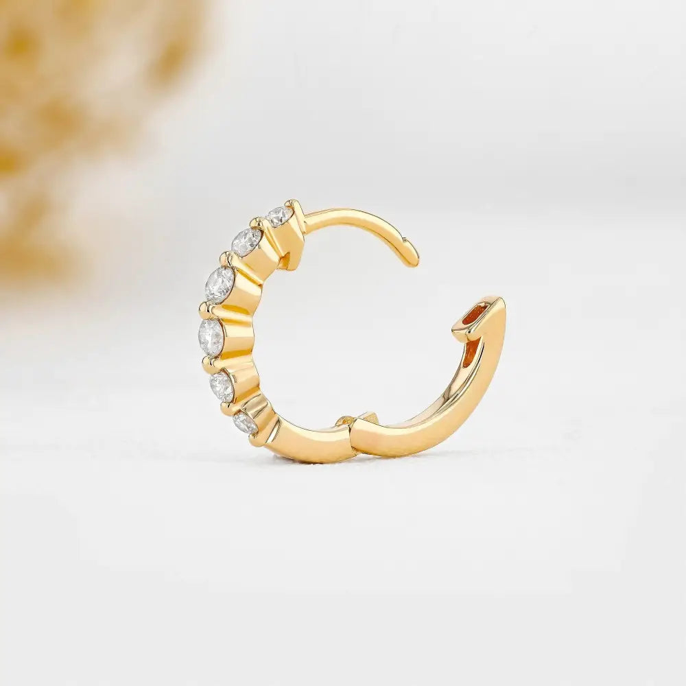 Stunning 14K Gold Diamond Graduated Huggie Hoop Earrings.