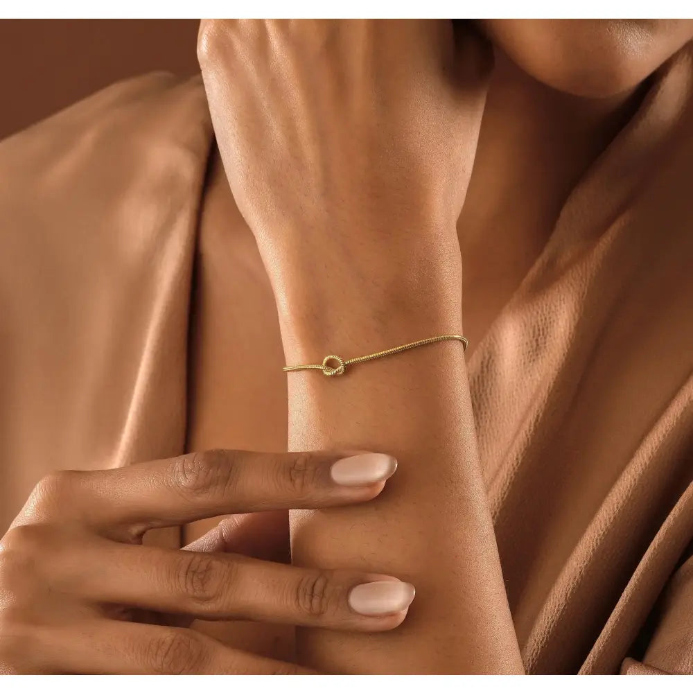 Stunning 14K Gold Love Knot Bracelet for Couples - Elegant Friendship Snake Chain Gift.