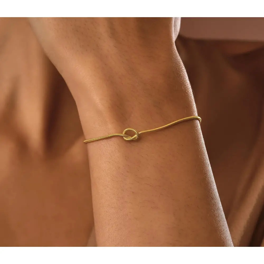 Stunning 14K Gold Love Knot Bracelet for Couples - Elegant Friendship Snake Chain Gift.