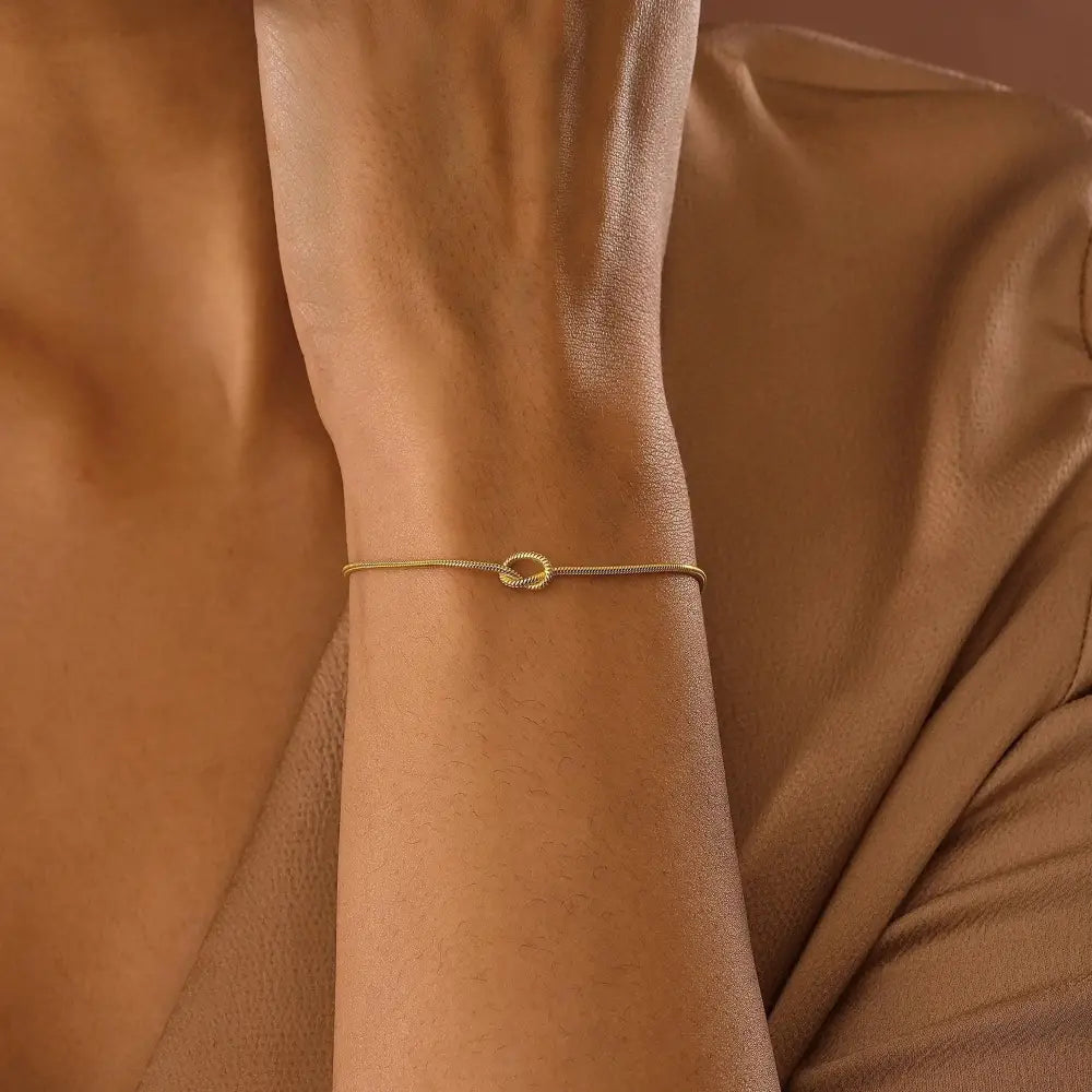 Stunning 14K Gold Love Knot Bracelet for Couples - Elegant Friendship Snake Chain Gift.