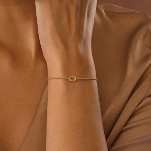 Stunning 14K Gold Love Knot Bracelet for Couples - Elegant Friendship Snake Chain Gift.