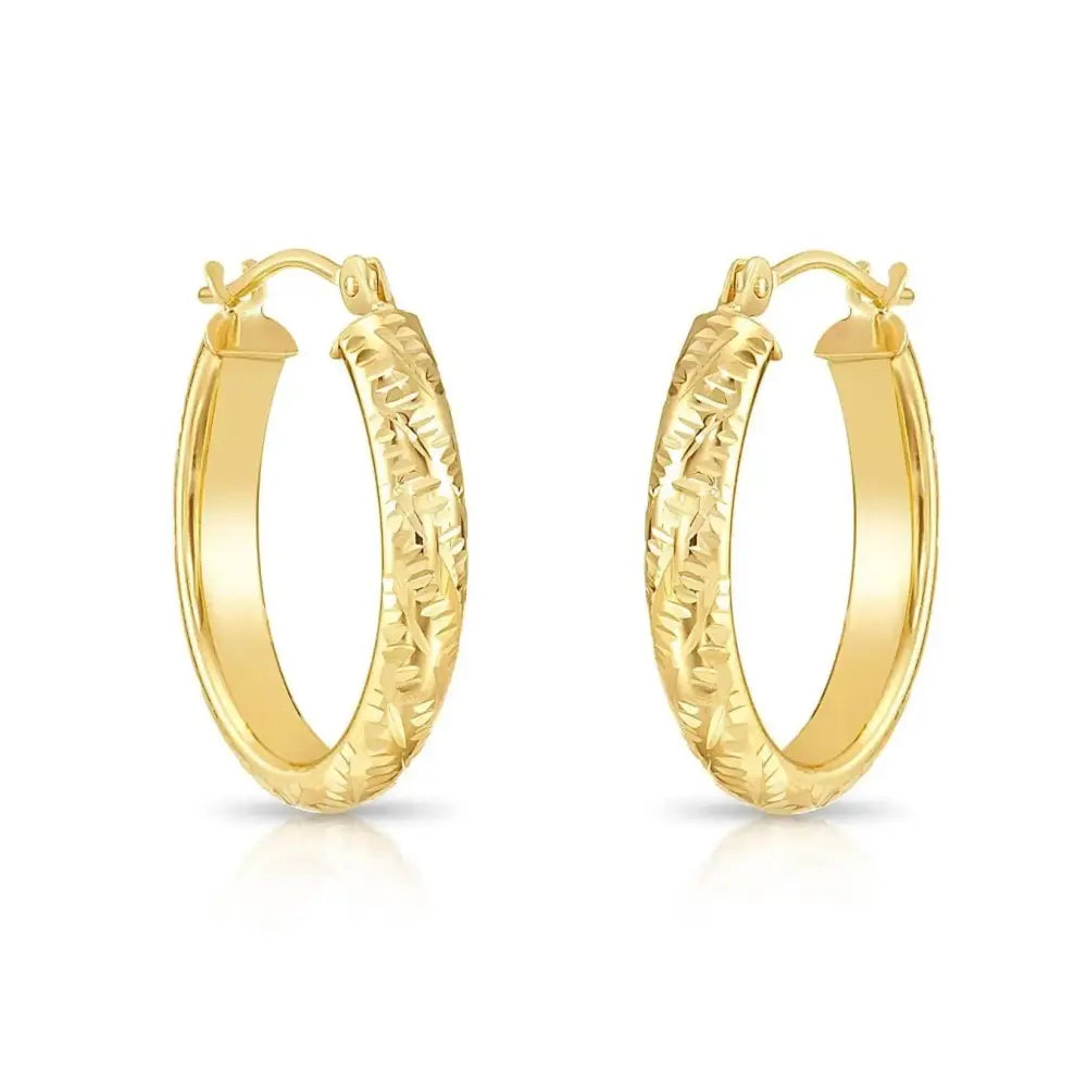 Stunning 14K Solid Gold Oval Hand-Engraved Tornado Pattern Diamond Cut Hoop Earrings.