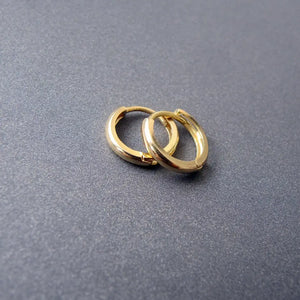 Stunning 14K Solid Gold Oval Hoop Earrings - Dainty Skinny Huggie Hoops for Elegant Women.