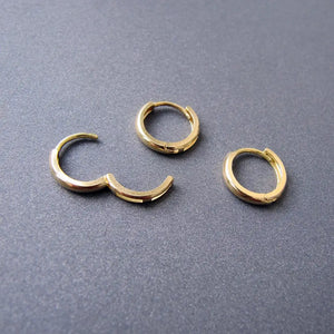 Stunning 14K Solid Gold Oval Hoop Earrings - Dainty Skinny Huggie Hoops for Elegant Women.