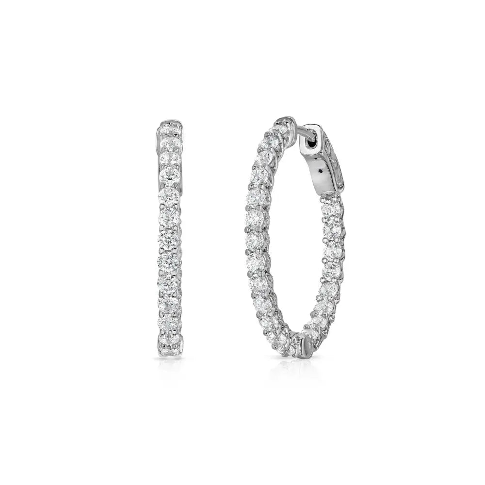 Stunning 14K Solid White Gold Half Eternity Huggie Hoop Earrings with 0.52 CTW Real Diamonds.
