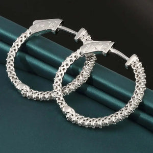 Stunning 14K Solid White Gold Half Eternity Huggie Hoop Earrings with 0.52 CTW Real Diamonds.