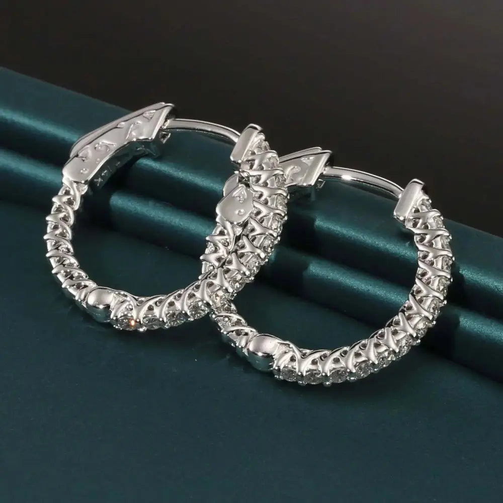 Stunning 14K Solid White Gold Half Eternity Huggie Hoop Earrings with 0.52 CTW Real Diamonds.