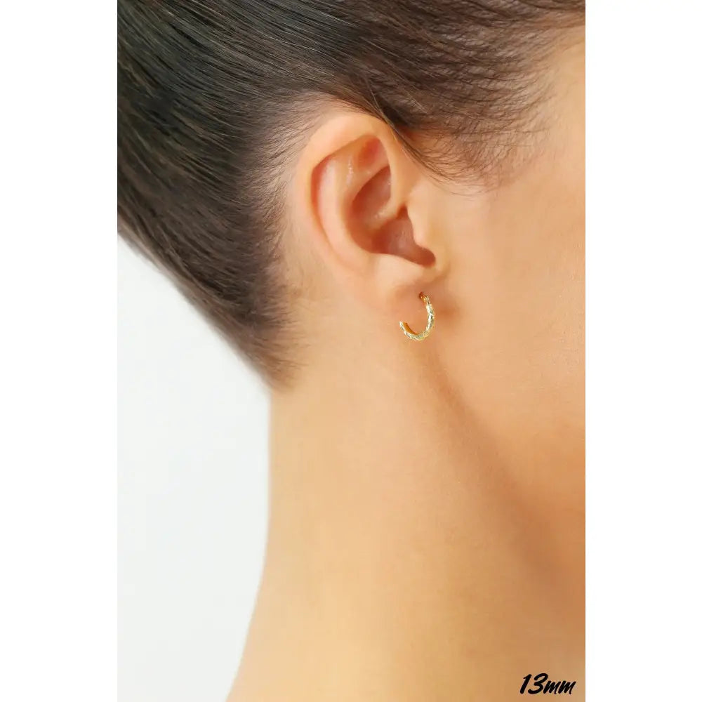 Stunning 14K Yellow Gold Diamond-Cut Hand Engraved "X-Pattern" Round Hoop Earrings - Available in Small, Medium, and Large by TILO Jewelry.