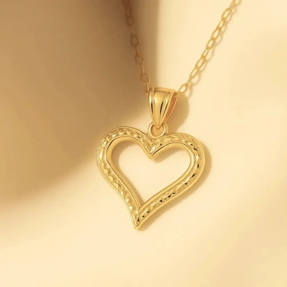 Stunning 14K Yellow Gold Diamond-Cut Heart Pendant Necklace with 18" Cable Chain.