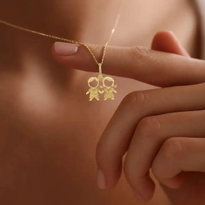 Stunning 14K Yellow Gold Heart Pendant Necklace Featuring Adorable Boy & Girl Design.