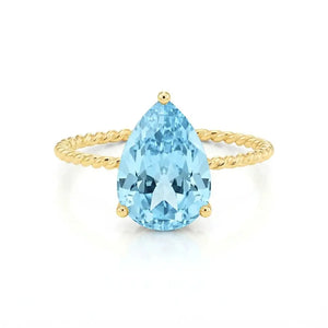 Stunning 14K Yellow Gold Pear-Cut Sky Blue Topaz Ring – The Perfect Elegant Birthstone Gift for Any Occasion.
