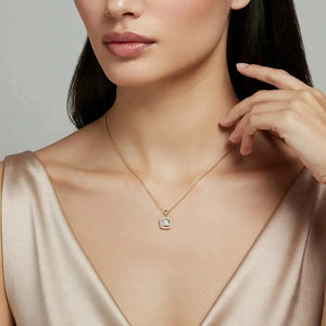 Stunning 14K Yellow Gold Princess-Cut Halo Pendant Necklace.