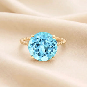 Stunning 14K Yellow Gold Sky Blue Topaz Ring - Perfect Birthday Gemstone Gift for Her!.
