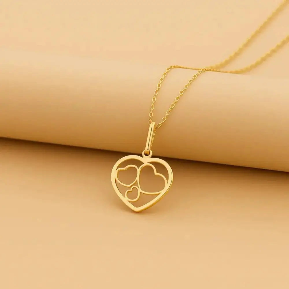 Stunning 14K Yellow Gold Triple Heart Pendant Necklace - The Perfect Timeless Gift.