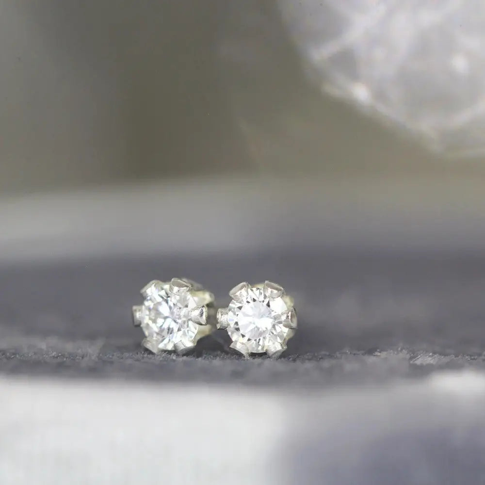 Stunning 2mm White Diamond Stud Earrings in Yellow Gold - Perfect Fine Jewelry Gift for Any Occasion.