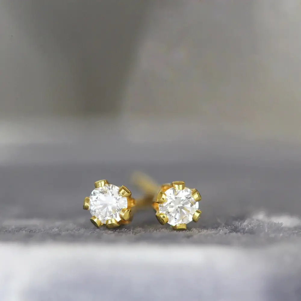 Stunning 2mm White Diamond Stud Earrings in Yellow Gold - Perfect Fine Jewelry Gift for Any Occasion.