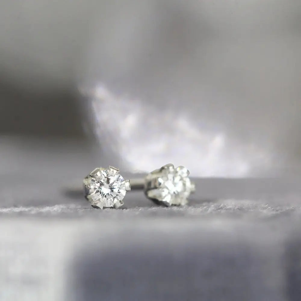 Stunning 2mm White Diamond Stud Earrings in Yellow Gold - Perfect Fine Jewelry Gift for Any Occasion.