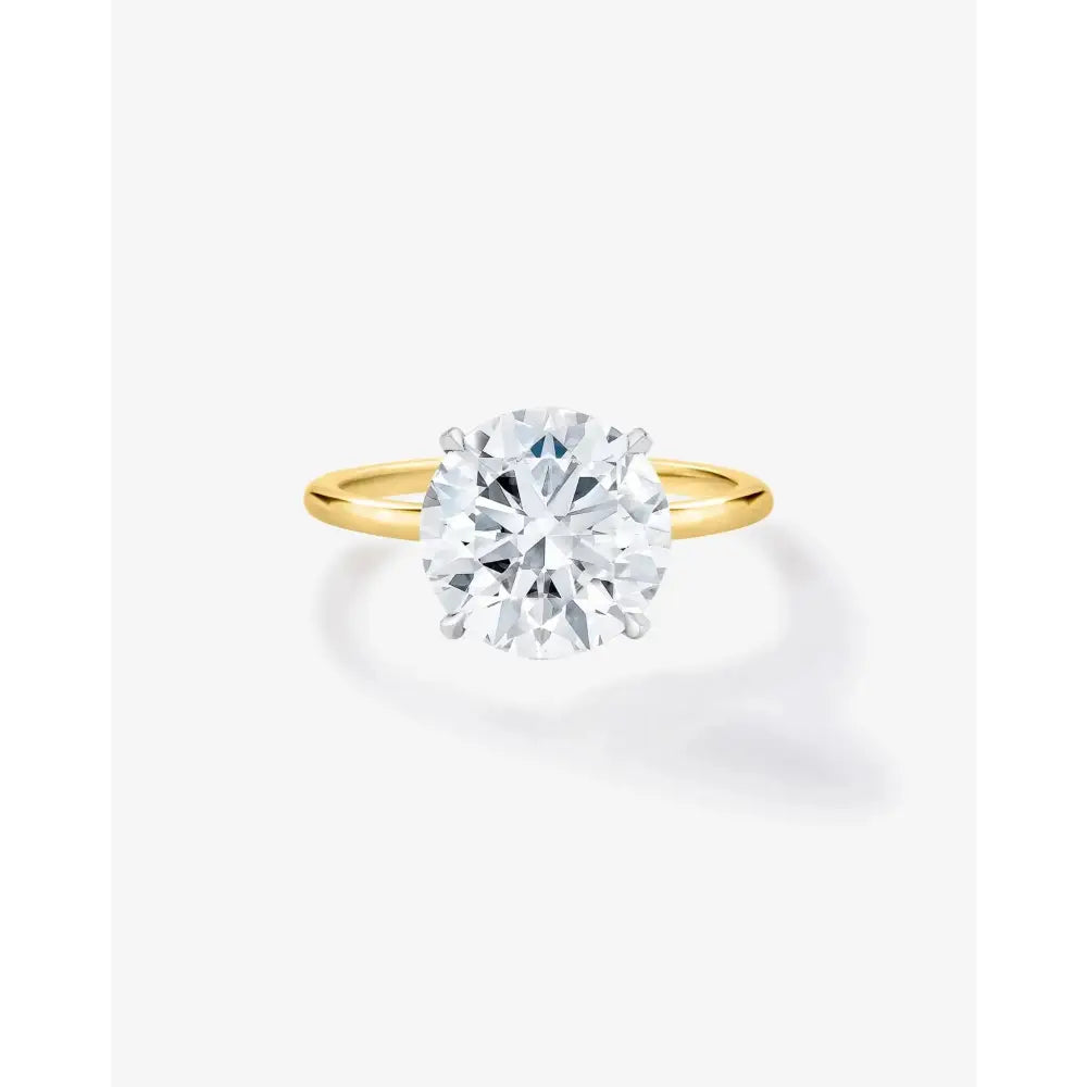 Stunning 4.11 Carat Lab Diamond with Whisper Thin® Hidden Halo.