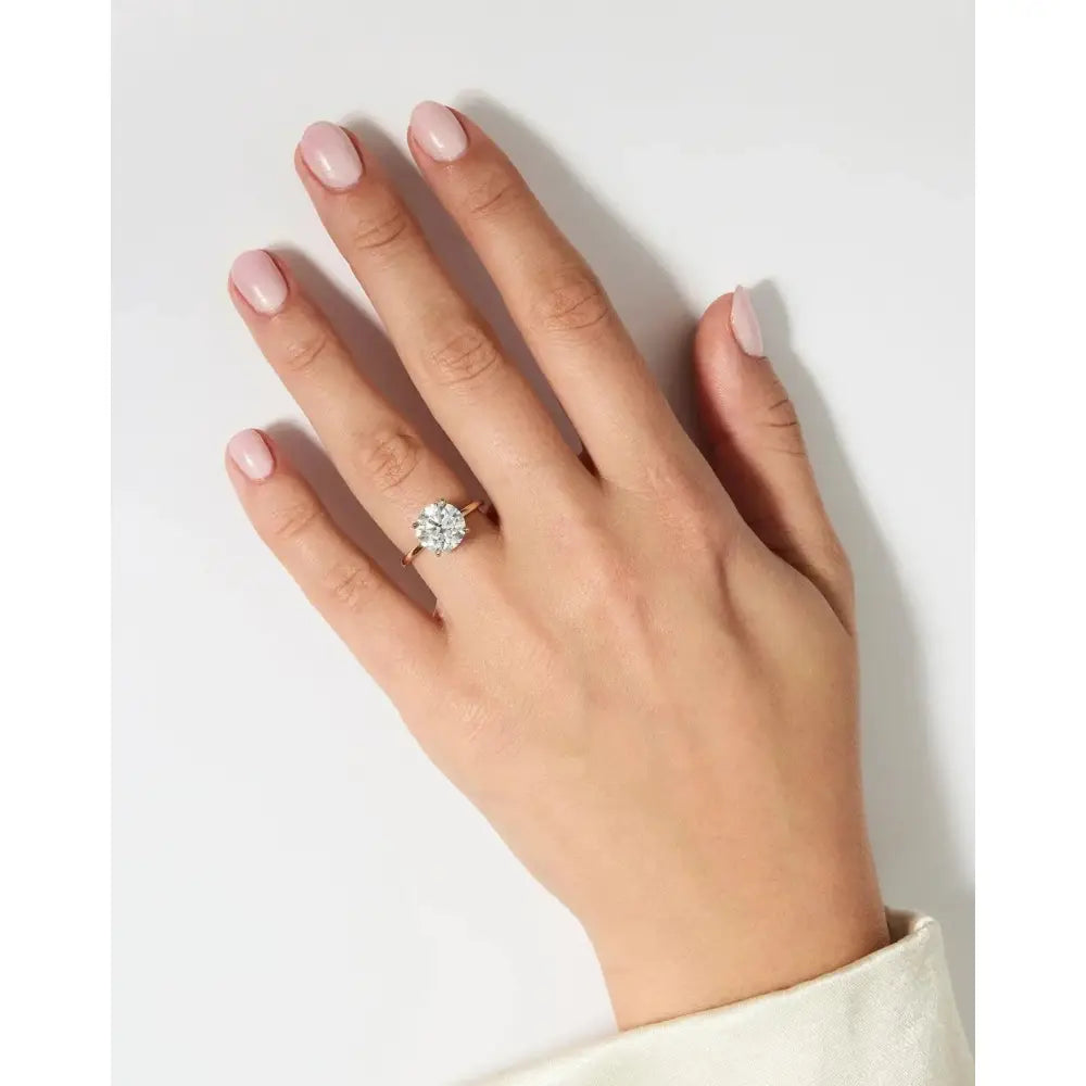 Stunning 4.60 Carat Round Lab Diamond with Whisper Thin® Hidden Halo.