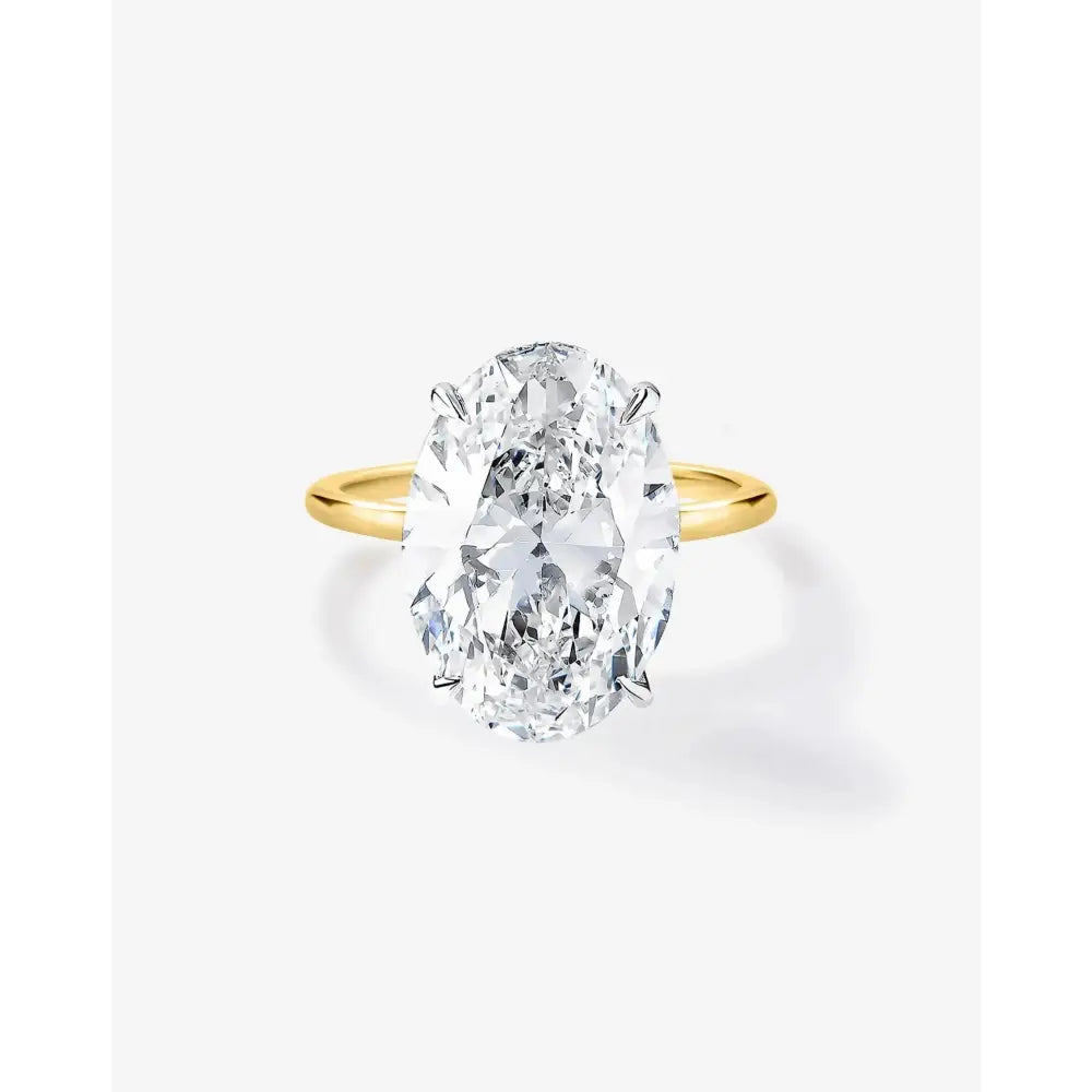Stunning 5.63ct Oval Lab Diamond with Whisper Thin® Hidden Halo - A Perfect Elegance.